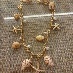 Gold and Cream Seashell Charm Necklace